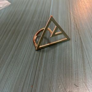 Triangle gold-colored ring